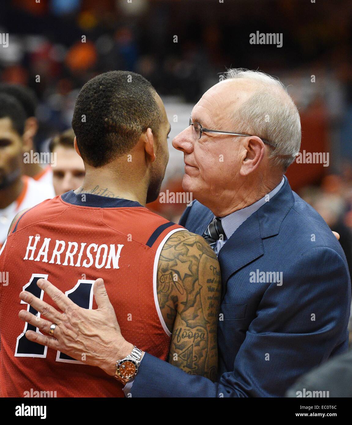 Syracuse, NY, USA. 6th Dec, 2014. Dec 6, 2014: Syracuse head coach Jim Boeheim greeted St. John's guard D'Angelo Harrison #11 after the St. John's Red Storm defeated the Syracuse Orange 69-57 at the Carrier Dome in Syracuse, NY. © csm/Alamy Live News Stock Photo