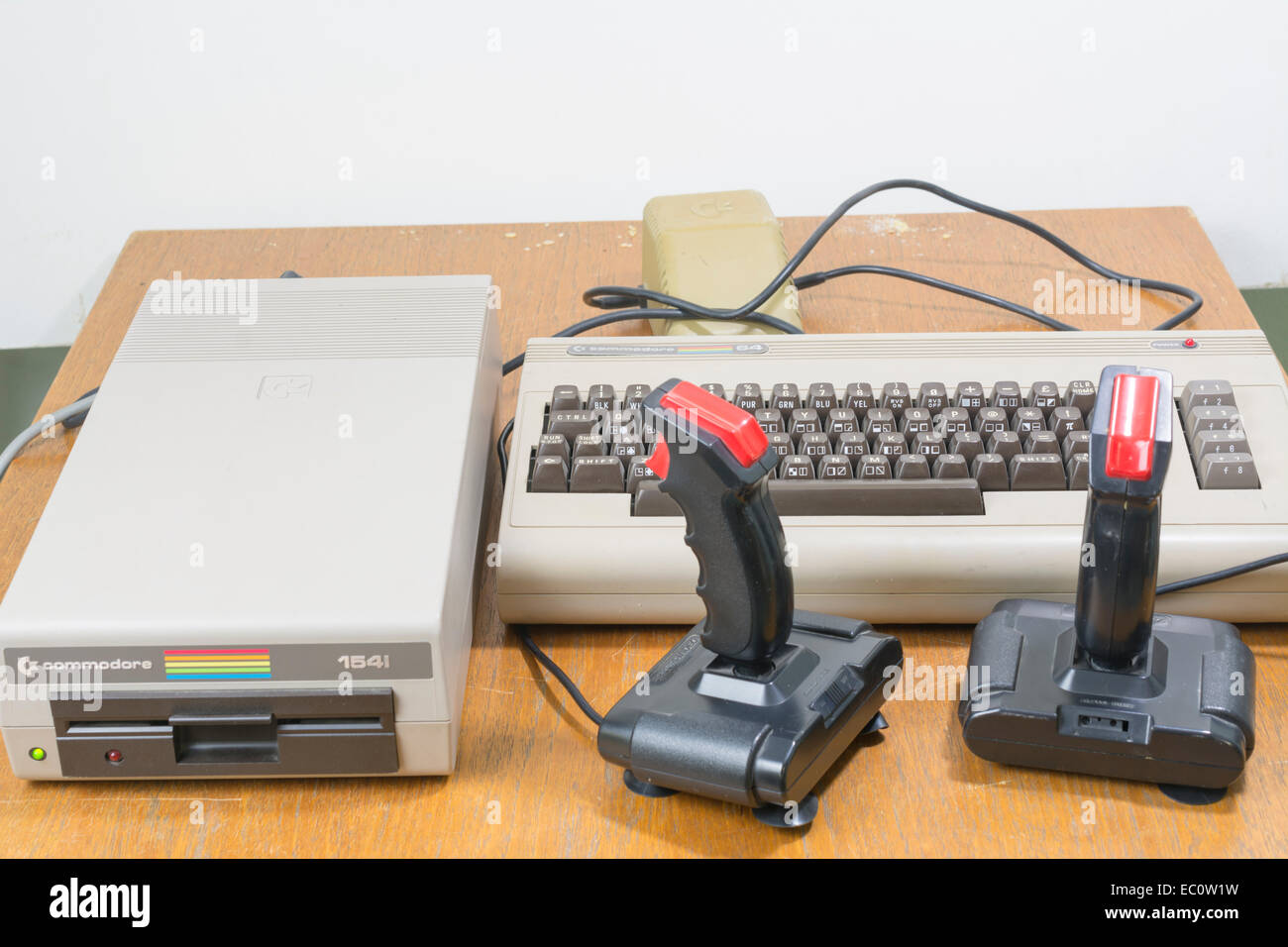Vintage Computer Commodore 64 with two Joysticks and a floppy drive Stock Photo