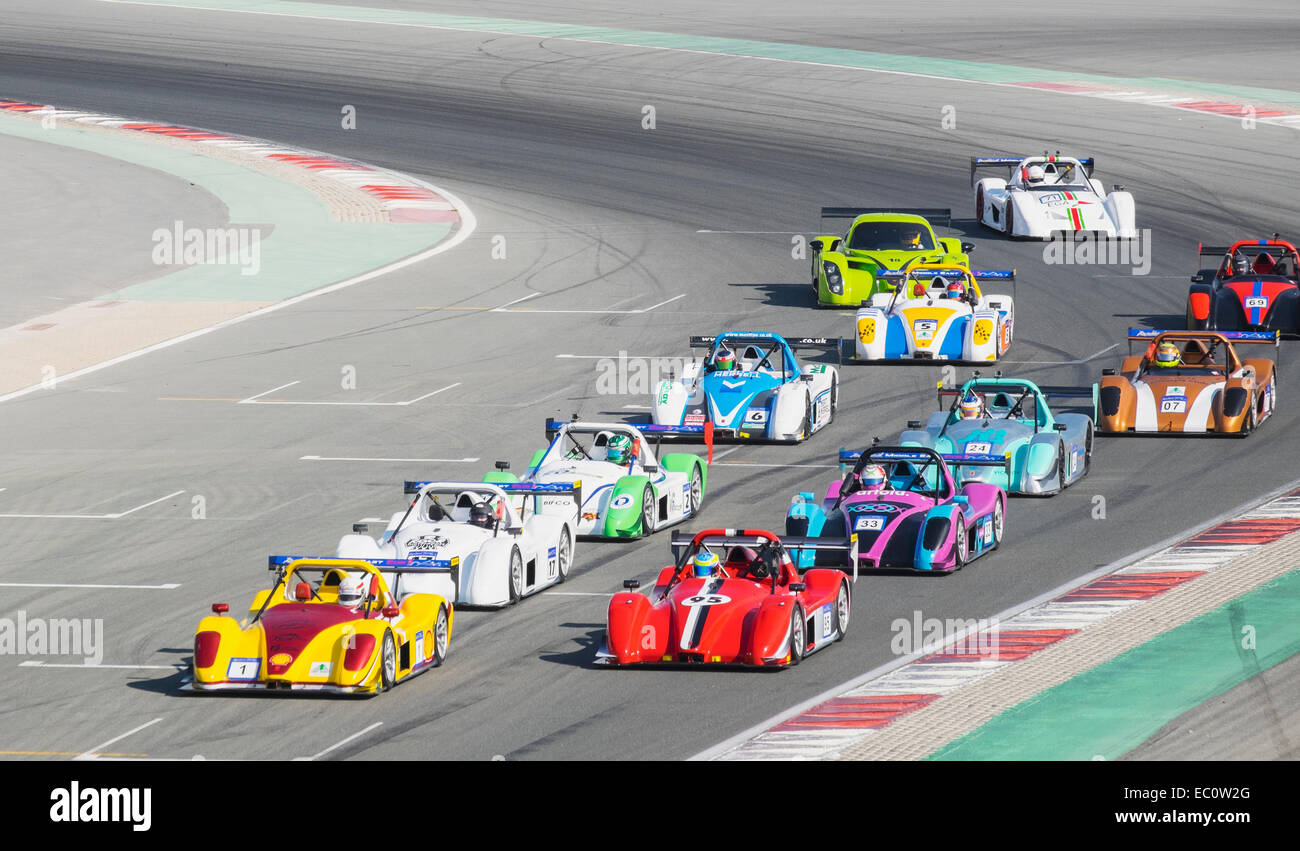 Start of motor race on circuit at Dubai Autodrome in Motor City United Arab Emirates Stock Photo