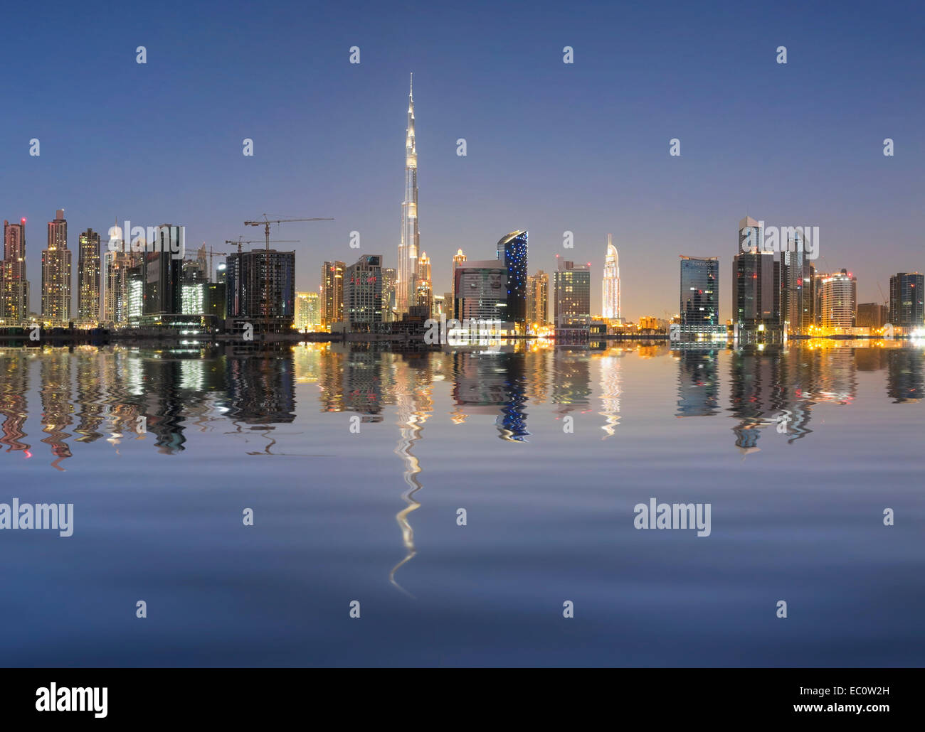 Evening skyline view of Burj Khalifa and Dubai from Business Bay district in United Arab Emirates Stock Photo