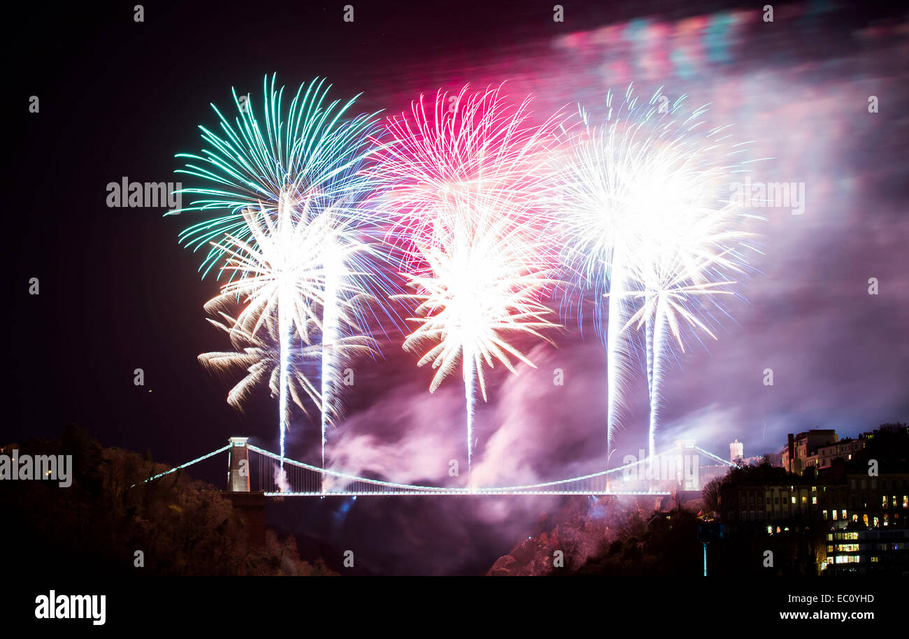 Bristol, UK. 7th Dec, 2014. Isambard Kingdom Brunel's Clifton Suspension Bridge marks the 150th anniversary of its opening with an elaborate fireworks display. Thousands of people lined the streets of Bristol to watch the event. The display was preceded by a one minute silence in memory of Charlotte Bevan and her daughter Zaani, whose bodies were discovered near the bridge earlier this week. Credit:  Adam Gasson/Alamy Live News Stock Photo