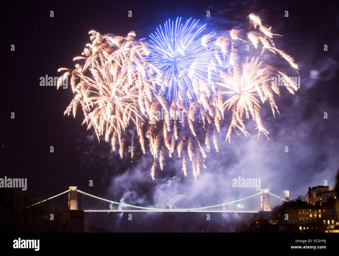 Bristol, UK. 7th Dec, 2014. Isambard Kingdom Brunel's Clifton Suspension Bridge marks the 150th anniversary of its opening with an elaborate fireworks display. Thousands of people lined the streets of Bristol to watch the event. The display was preceded by a one minute silence in memory of Charlotte Bevan and her daughter Zaani, whose bodies were discovered near the bridge earlier this week. Credit:  Adam Gasson/Alamy Live News Stock Photo