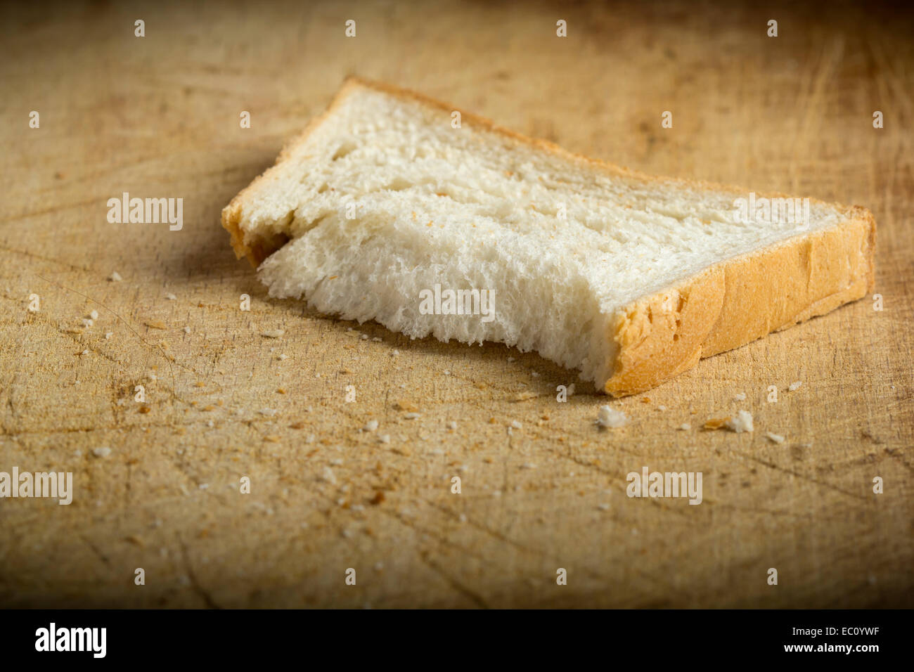 Some dry bread on a wood table Stock Photo