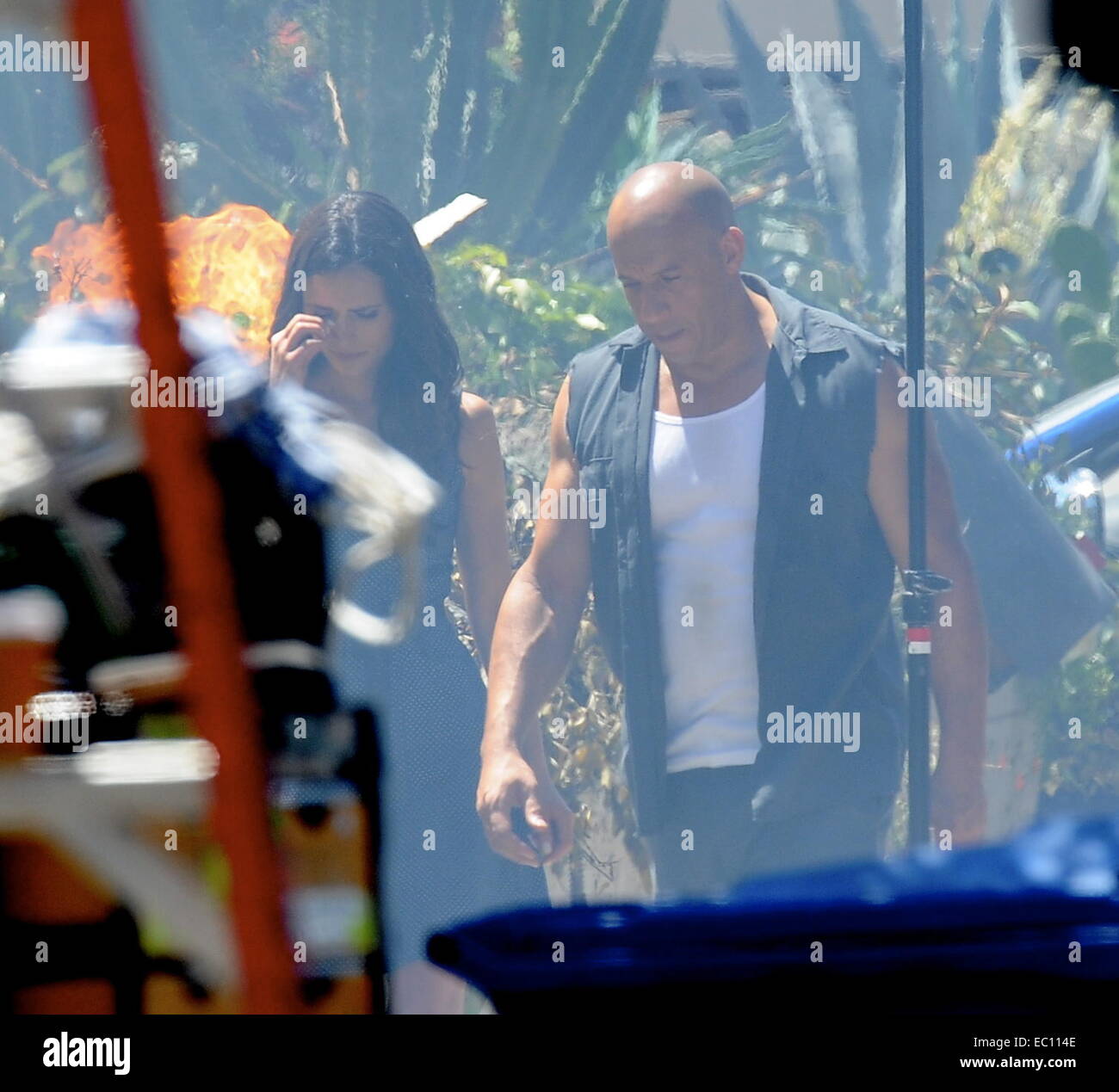 Vin Diesel shows off his biceps while filming an action scene for 'Fast ...