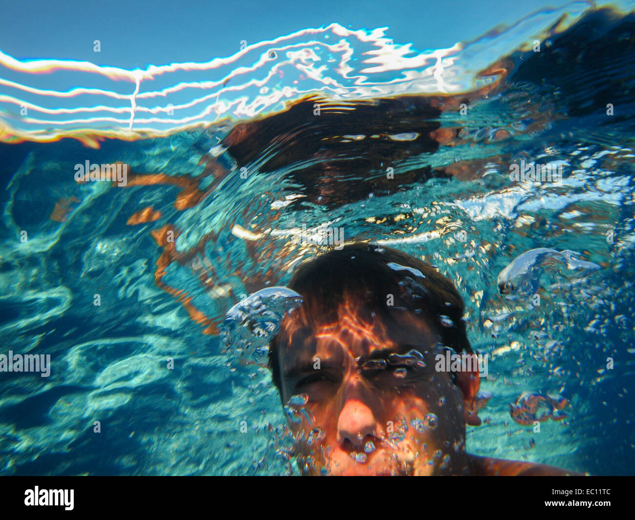 under water bubbles person thinking Stock Photo