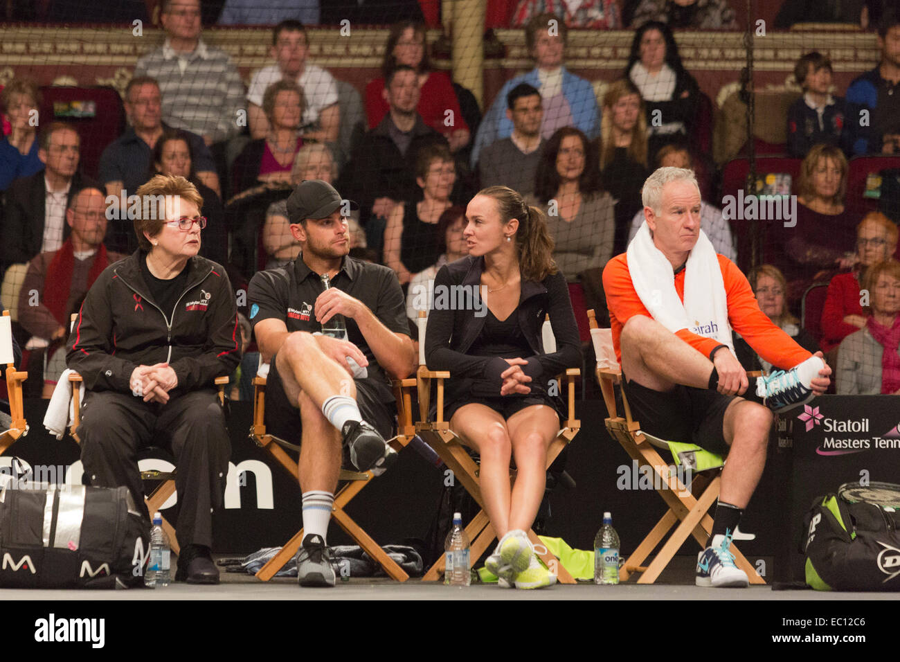 London, UK. 7 December 2014. L-R: Billie Jean King, Andy Roddick, Martina Hingis and John McEnroe. 22nd Mylan World Team Tennis Smash Hits, taking place at the Royal Albert Hall, London, for the first time. Event participants include Team Elton John: Andy Roddick, John McEnroe, Heather Watson and Martina Hingis and Team Billie Jean: Kim Clijsters, Sabine Lisicki, Tim Henman and Jamie Murray. The event raises money for the Elton John Aids Foundation (EJAF). The event takes place during Statoil Masters Tennis and the 2014 event was won by Team Billie Jean. Credit:  Nick Savage/Alamy Live News Stock Photo