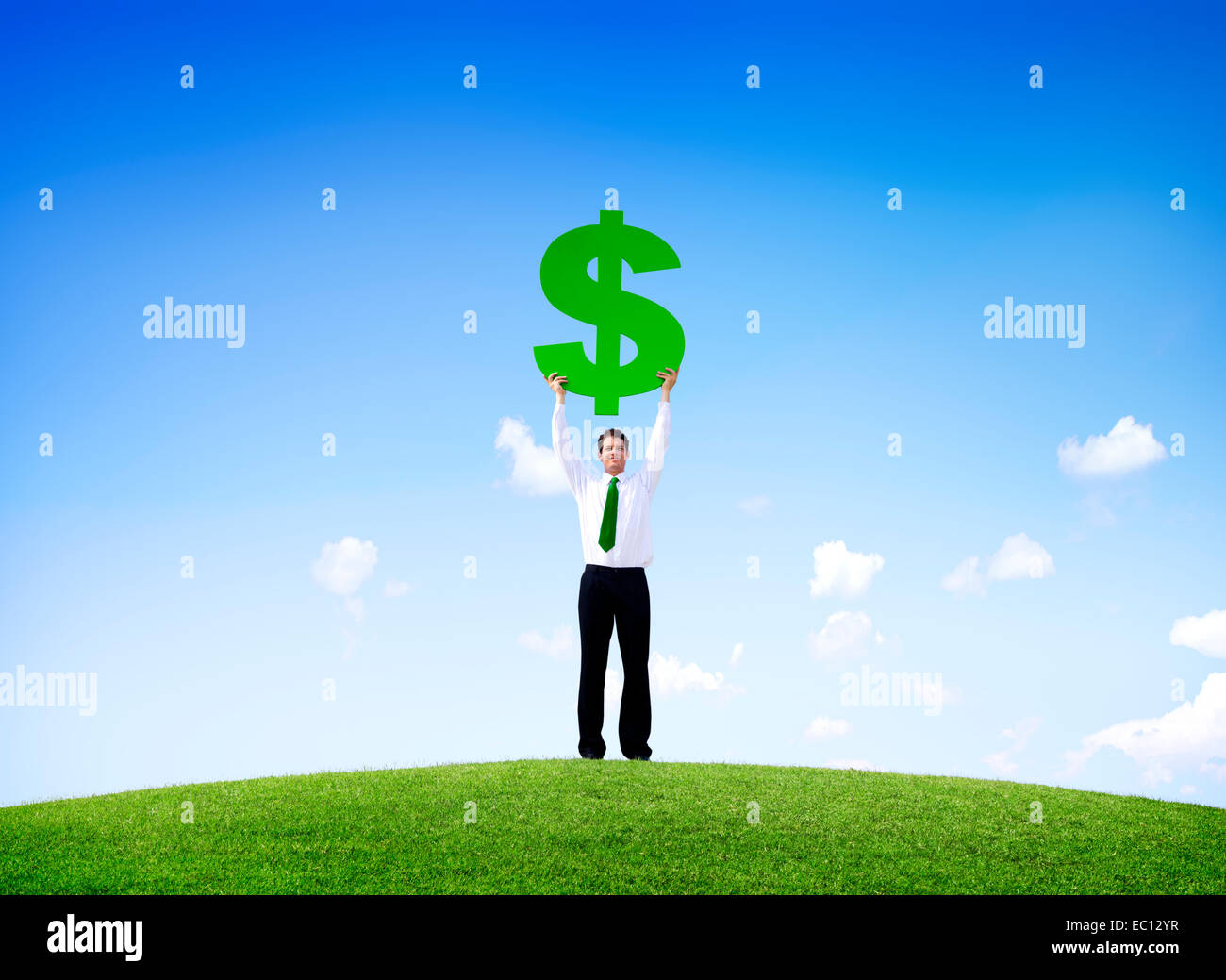 Business man holding dollar sign hi-res stock photography and images ...