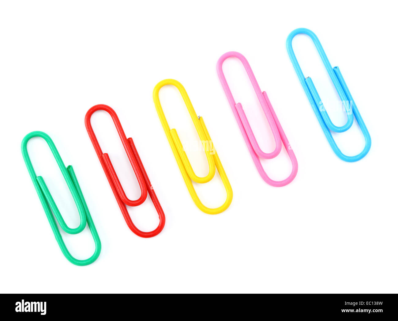 Colored paper clips on a white background closeup Stock Photo