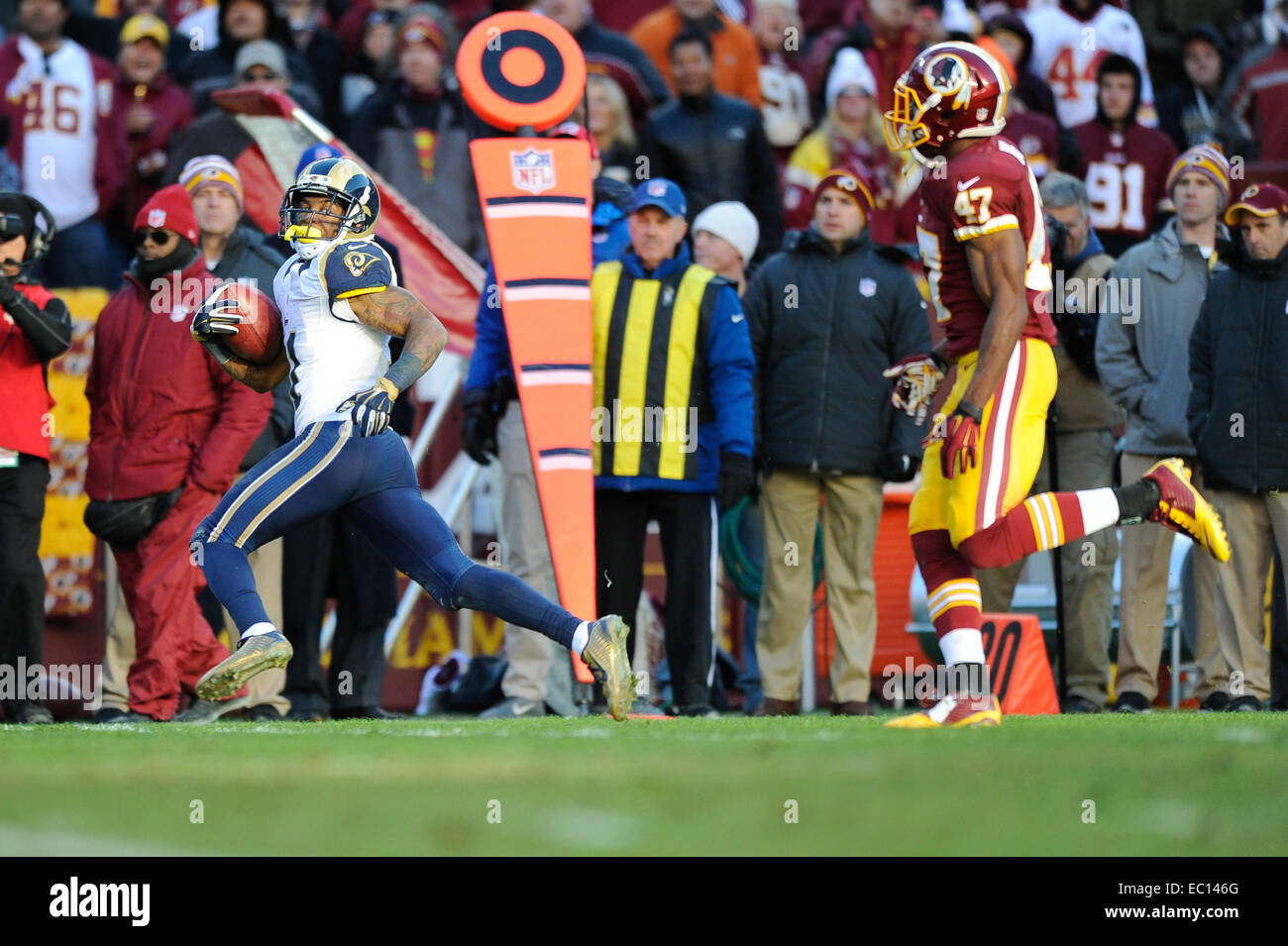 Landover, Maryland, USA. 07th Dec, 2014. St. Louis Rams wide receiver Tavon Austin (11) runs a punt back all the way for a touchdown during the matchup between the St. Louis Rams and the Washington Redskins at FedEx Field in Landover, MD. Credit:  Cal Sport Media/Alamy Live News Stock Photo