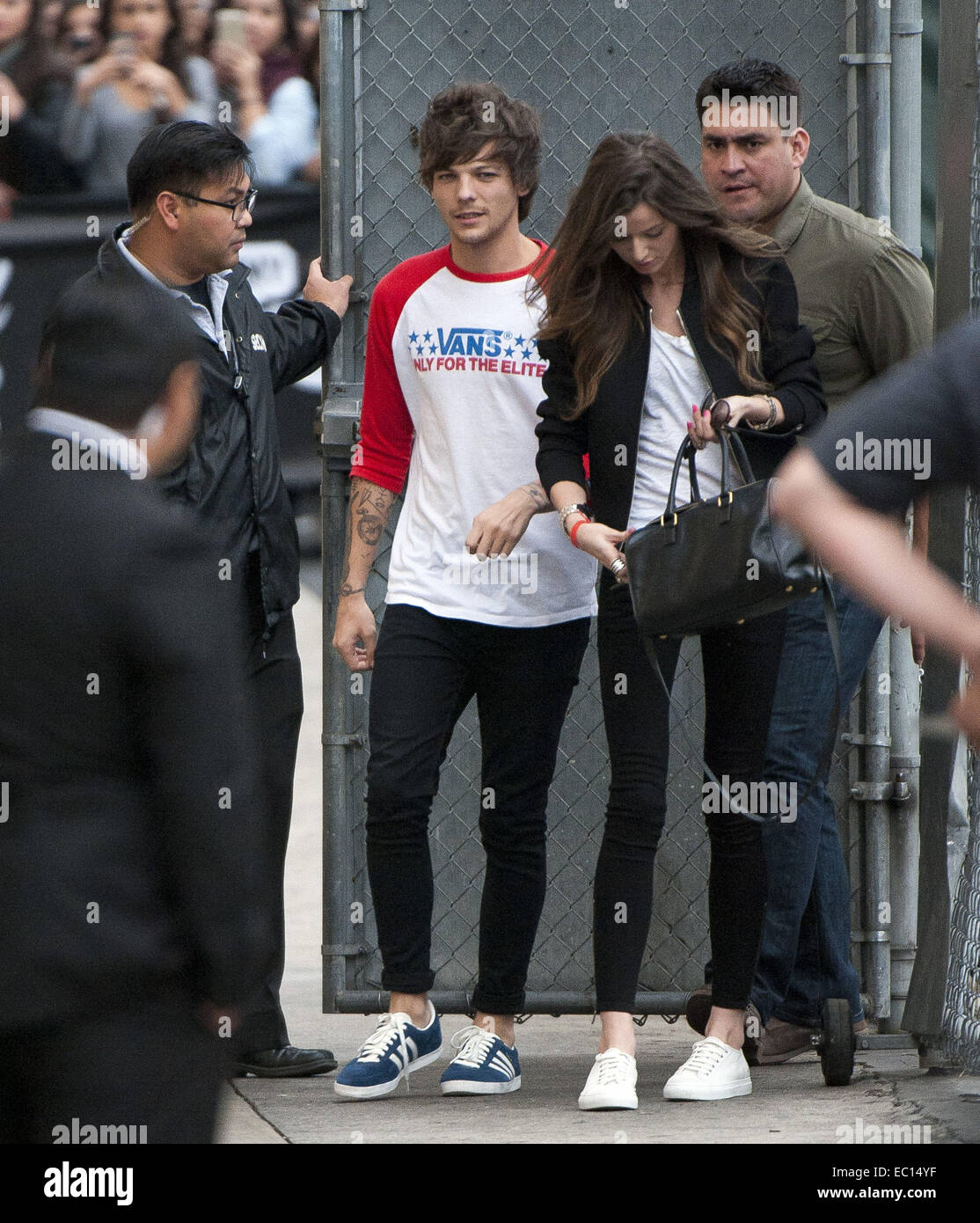 Hollywood, California, USA. 20th Nov, 2014. English rocker, LOUIS TOMLINSON,  from the British boy band, One Direction, arrives for his appearance at  Jimmy Kimmel Live! accompanied by his girlfriend ELEANOR CALDER on