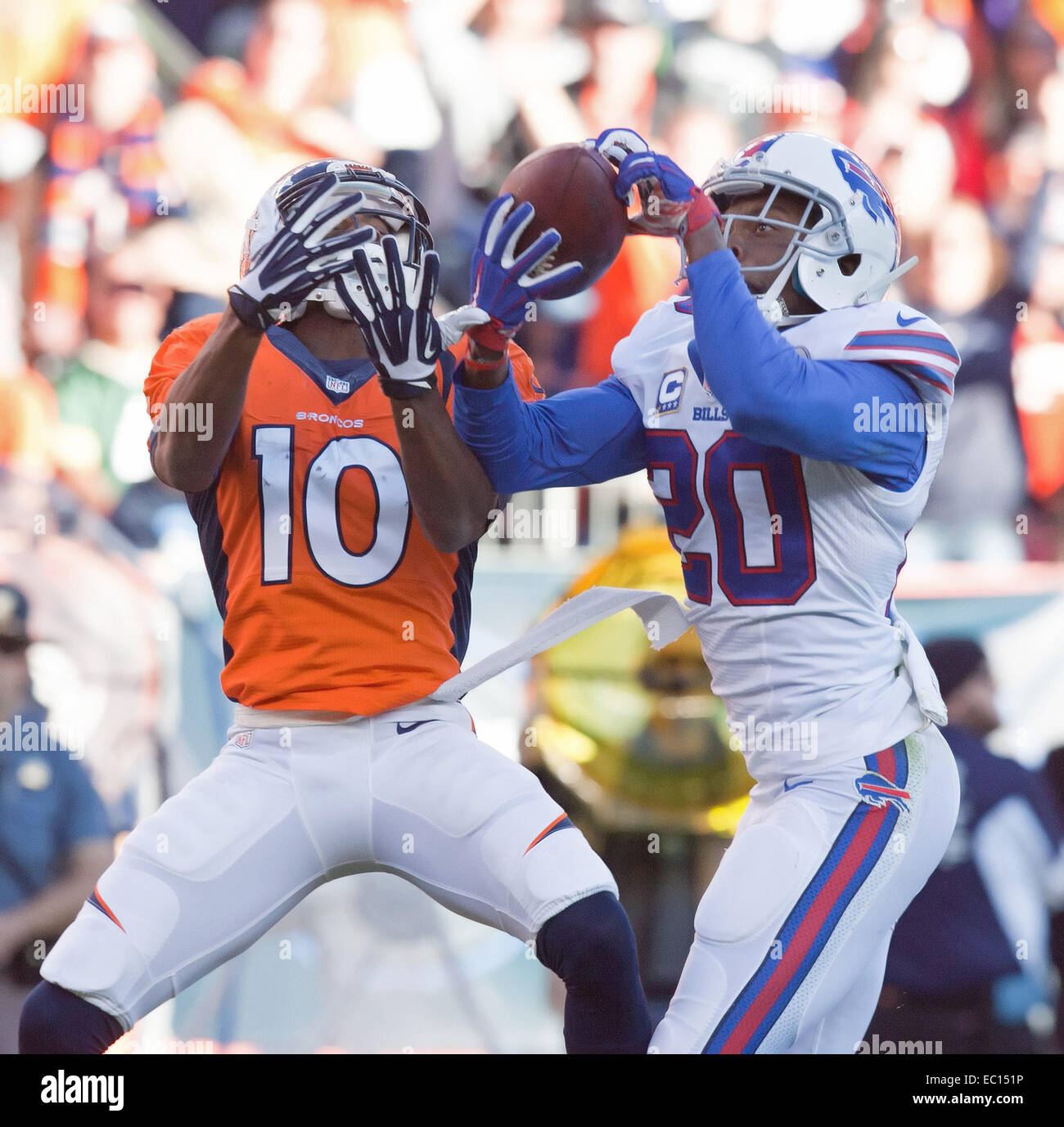 Denver, Colorado, USA. 7th Dec, 2014. Broncos WR EMMANUEL SANDERS, left, battles with Bills CB COREY GRAHAM, right, after the ball is intercepted during the 1st. Half at Sports Authority Field at Mile High Sunday afternoon. The Broncos beat the Bills 24-17. Credit:  Hector Acevedo/ZUMA Wire/Alamy Live News Stock Photo
