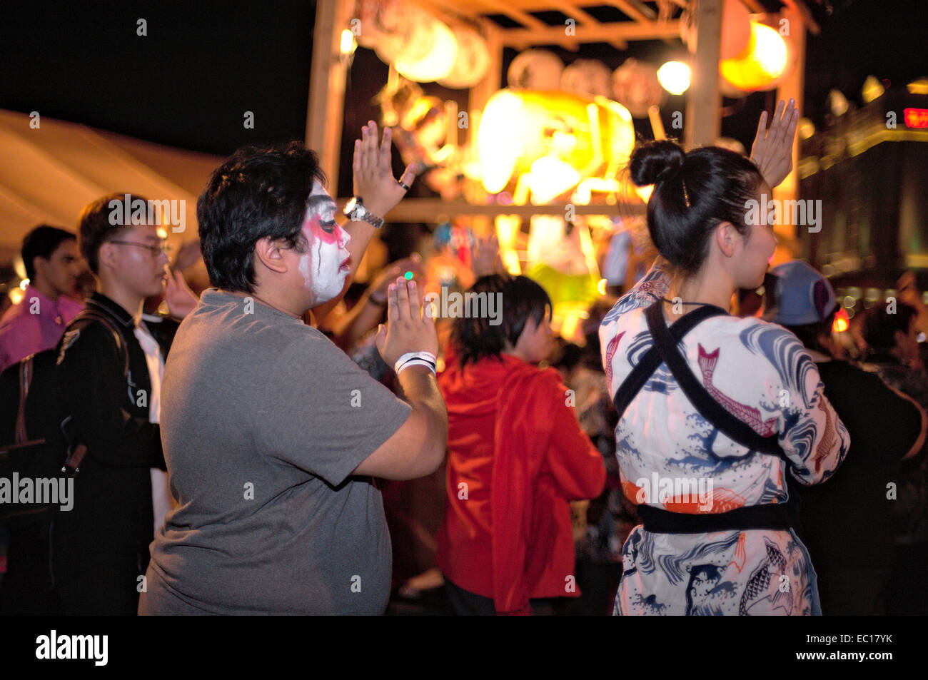 Festival participants dancing during the Bon Odori dance at the Las Vegas Akimatsuri, October 25, 2014. Dancers dance around the Stock Photo