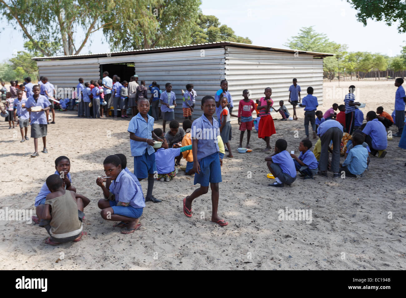 NAMIBIA, KAVANGO, OCTOBER 15: Happy Namibian school children waiting for a lesson. Kavango was the region with the highest pover Stock Photo