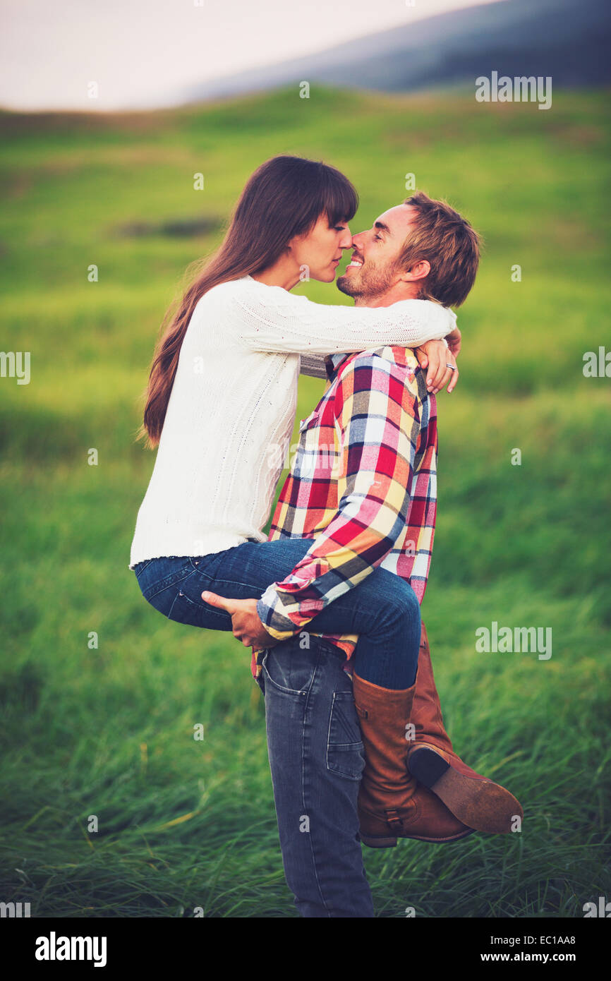 Romantic Young Couple in Love Outdoors Stock Photo