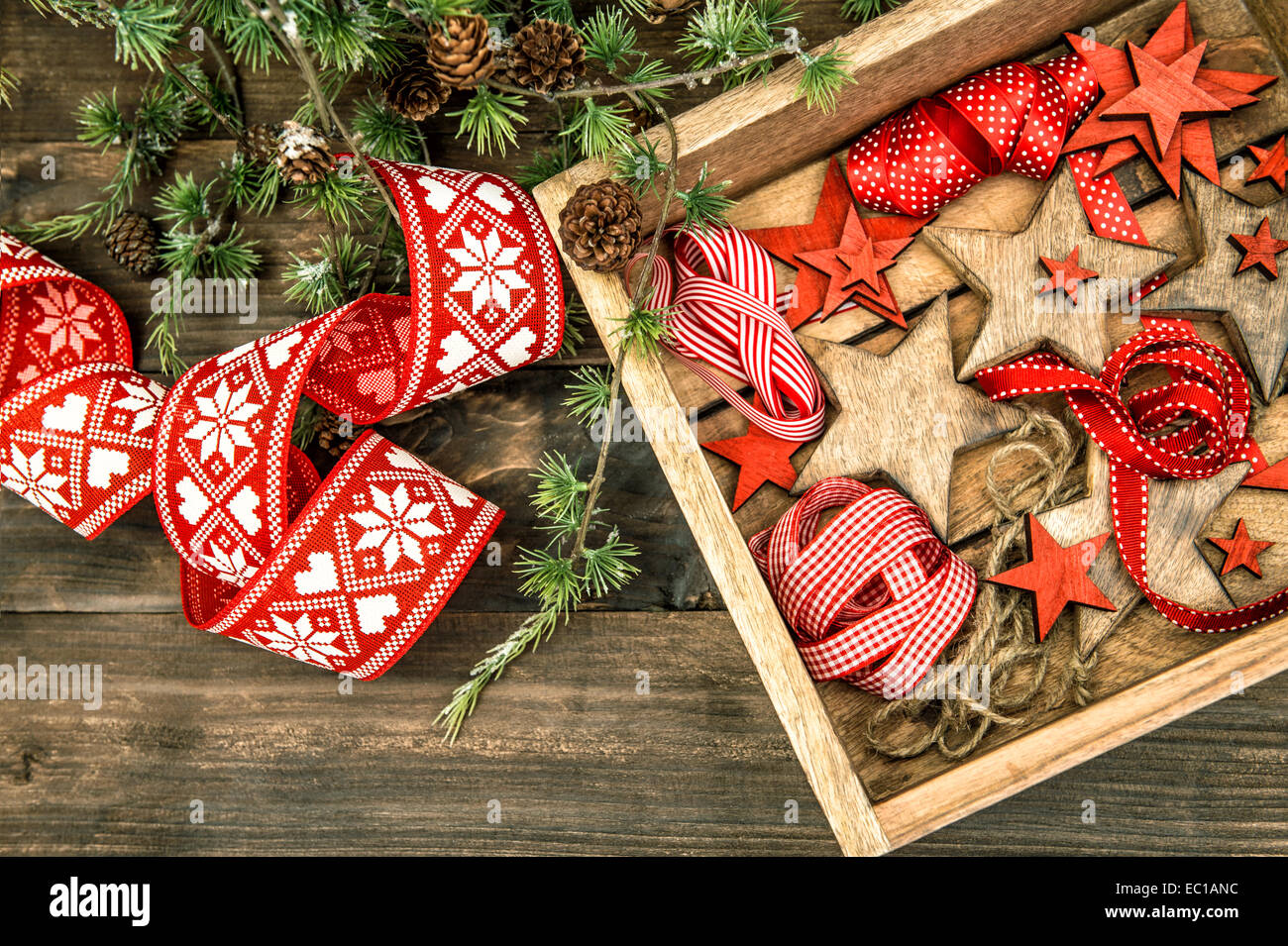 christmas decorations wooden stars and red ribbons with pine tree ...