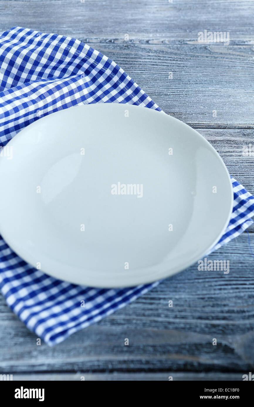Plate on a checkered napkin, close-up Stock Photo