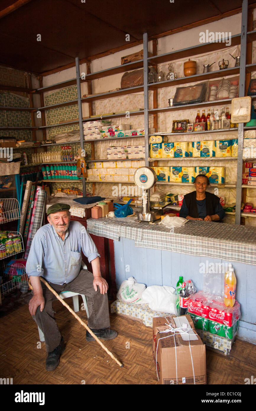 Shopkeeper and customer at Kontovazena town. Arcadia, Peloponnese, Greece Stock Photo