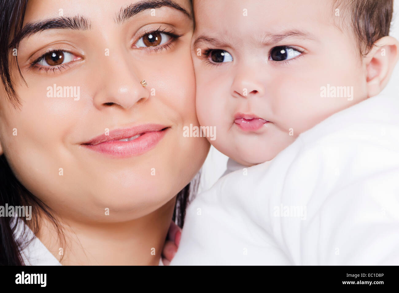 Indian Mother Caring his Baby Stock Photo