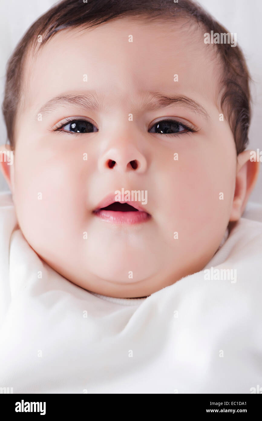 1 Indian Kid Lying Down at Home Stock Photo Alamy