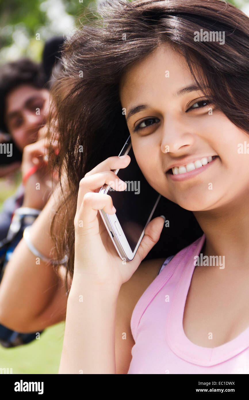 indian group crowds park talking phone Stock Photo - Alamy