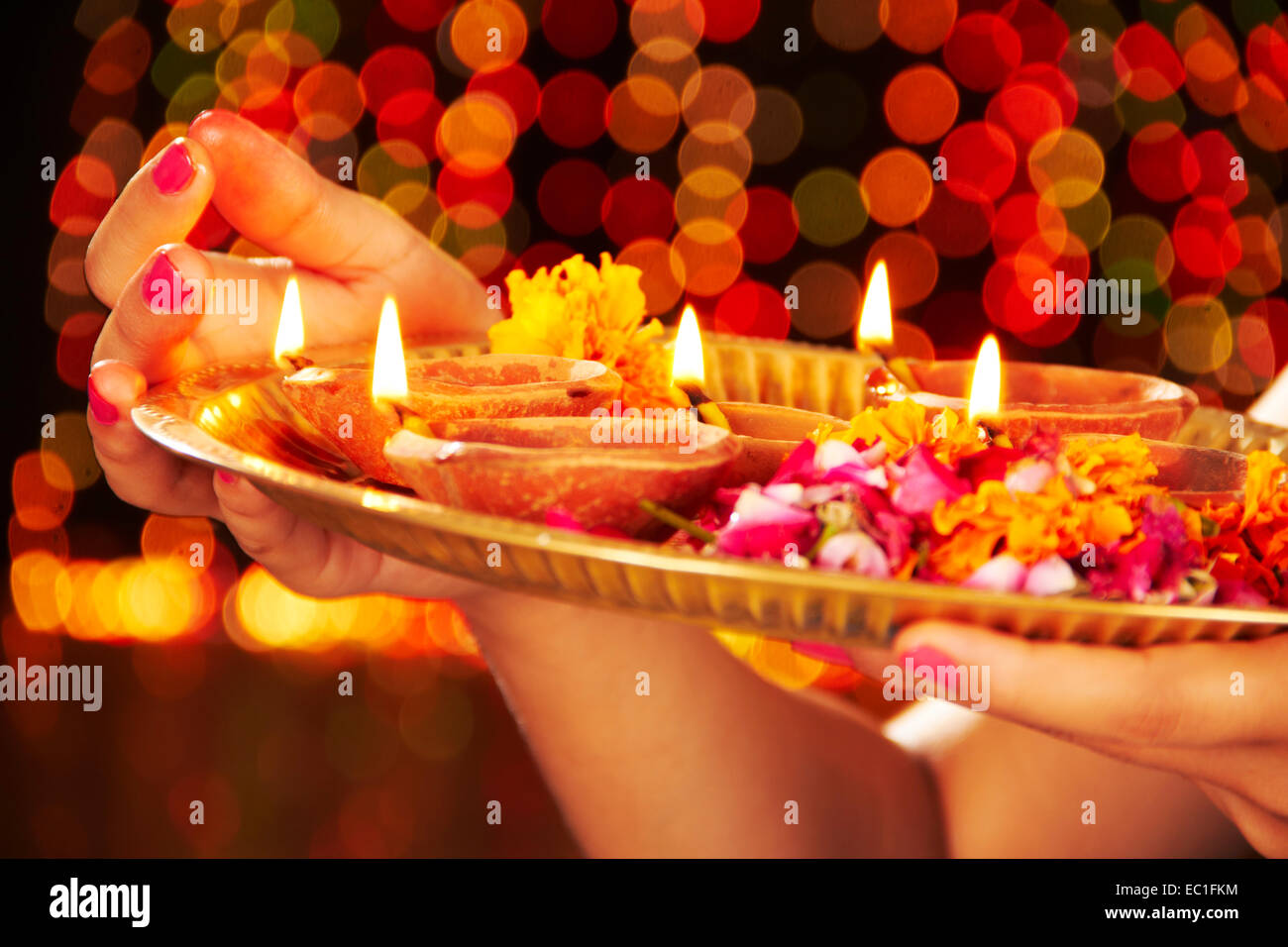 1 indian girl Festival Diwali Diya thali Worship Stock Photo - Alamy