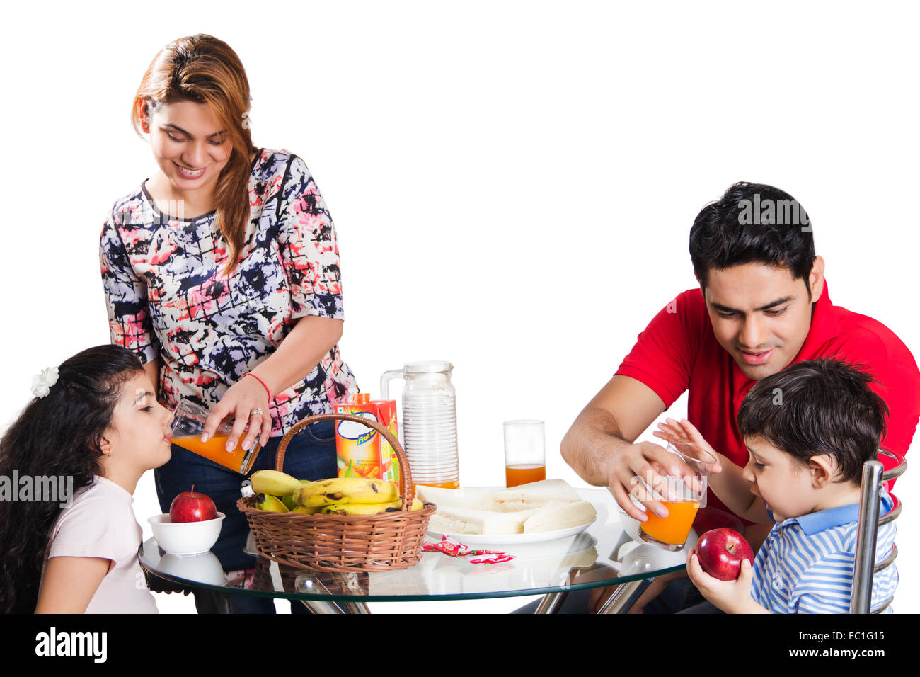 indian Parents with child Breakfast Stock Photo - Alamy