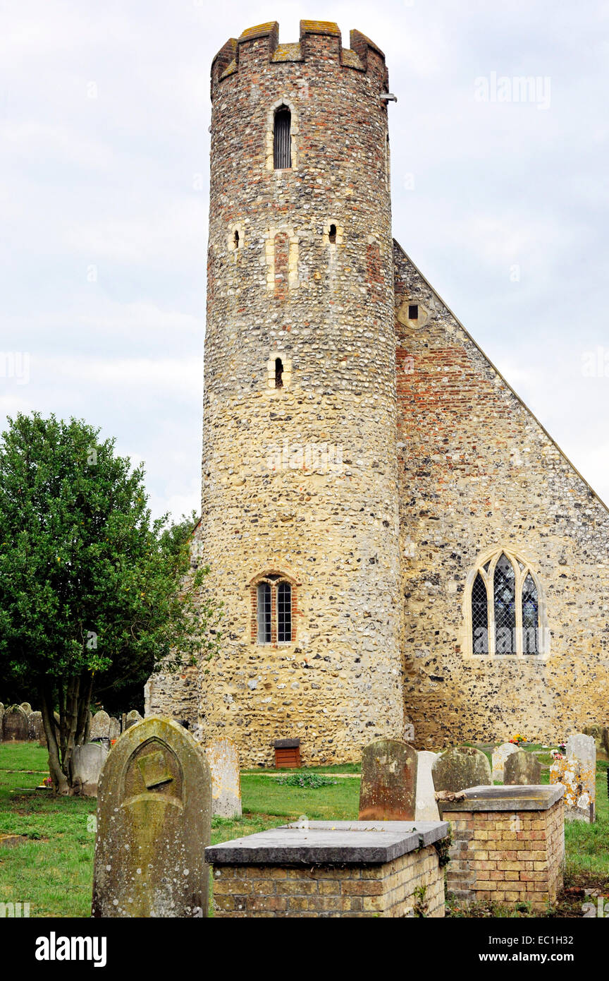 graves and St Mary’s church, Blundeston near Lowestoft, Suffolk. Norman