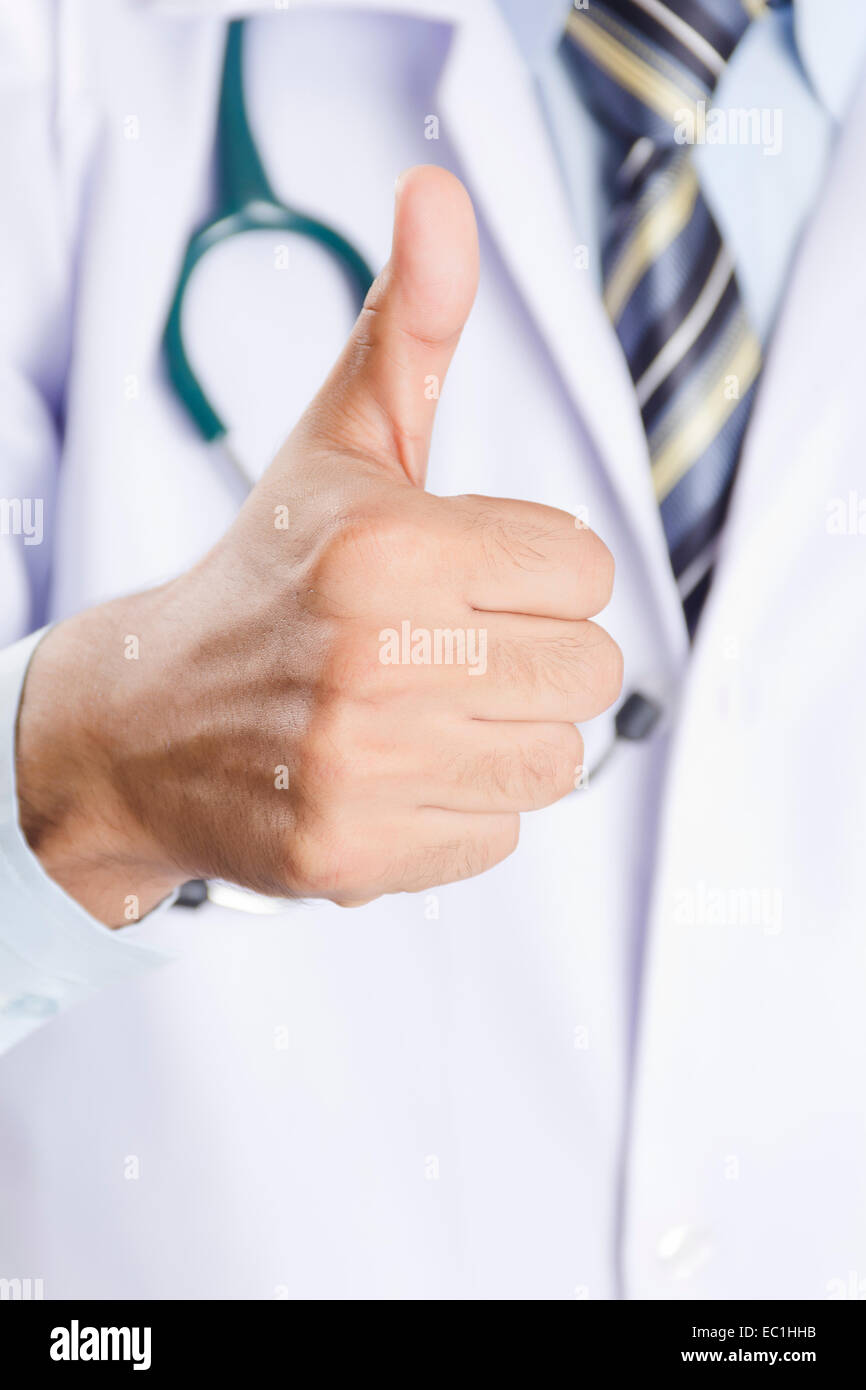 Young indian doctor showing thumb hi-res stock photography and images ...