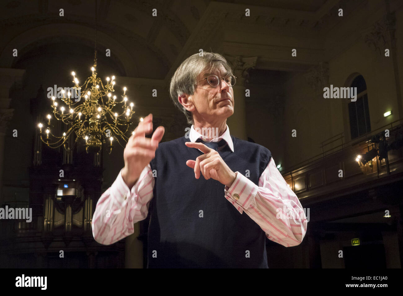 Hilary Davan Wetton, conducting the City of London Choir in St John's Smith Square. He is Musical Director also of the Hastings Philharmonic Choir and the Surrey Festival Choir, and Conductor Emeritus of the Milton Keynes City Orchestra, MKCO, (of which he was Founder Conductor) and of the Guildford Choral Society which he conducted from 1968 - 2008. Stock Photo