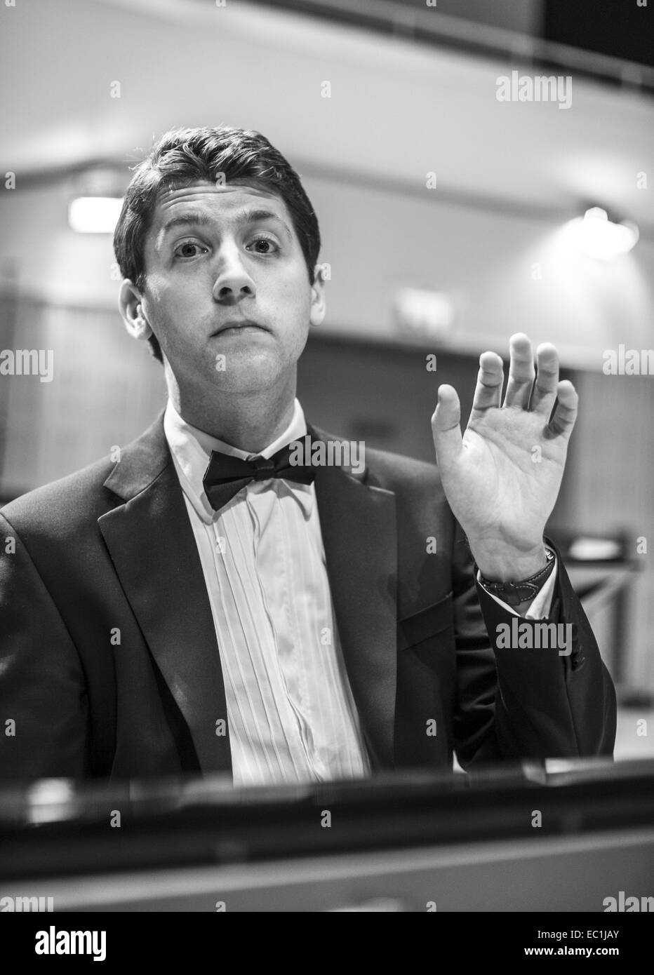 Finghin Collins, concert pianist. Rehearsing with RTE Symphony Orchestra, in the National Concert Hall, Dublin. Winner of the Stock Photo