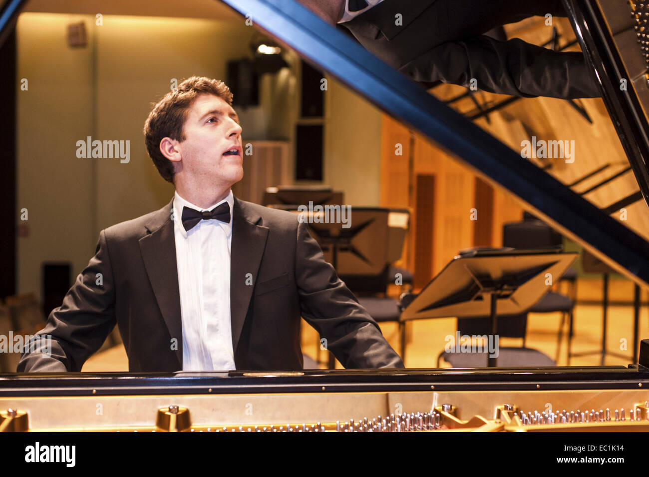 Finghin Collins, concert pianist. Rehearsing with RTE Symphony Orchestra, in the National Concert Hall, Dublin. Winner of the Stock Photo