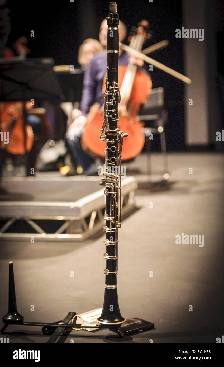 Basset Clarinet, standing on rehearsal platform. The range of the A clarinet  is extended downwards to cover the compass required for the Mozart Clarinet  Concerto. K(KV) 622. Clarinet by Yamaha Stock Photo -