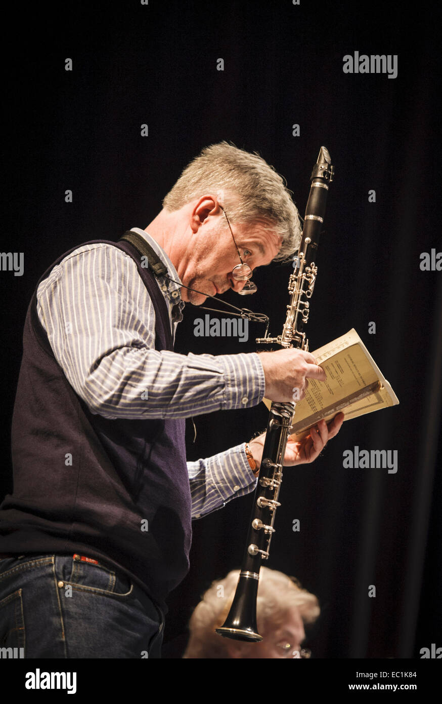 Basset Nicholas Cox, soloist, examining the score of