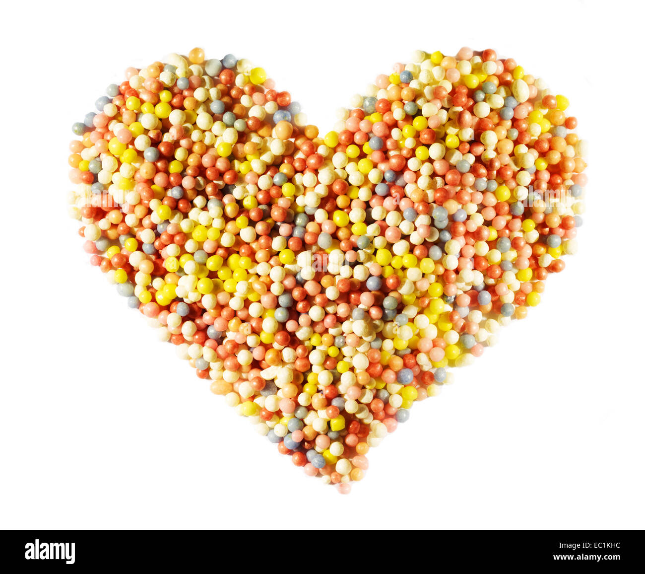 Heart shape made from 100's and 1000's sugar balls. Stock Photo