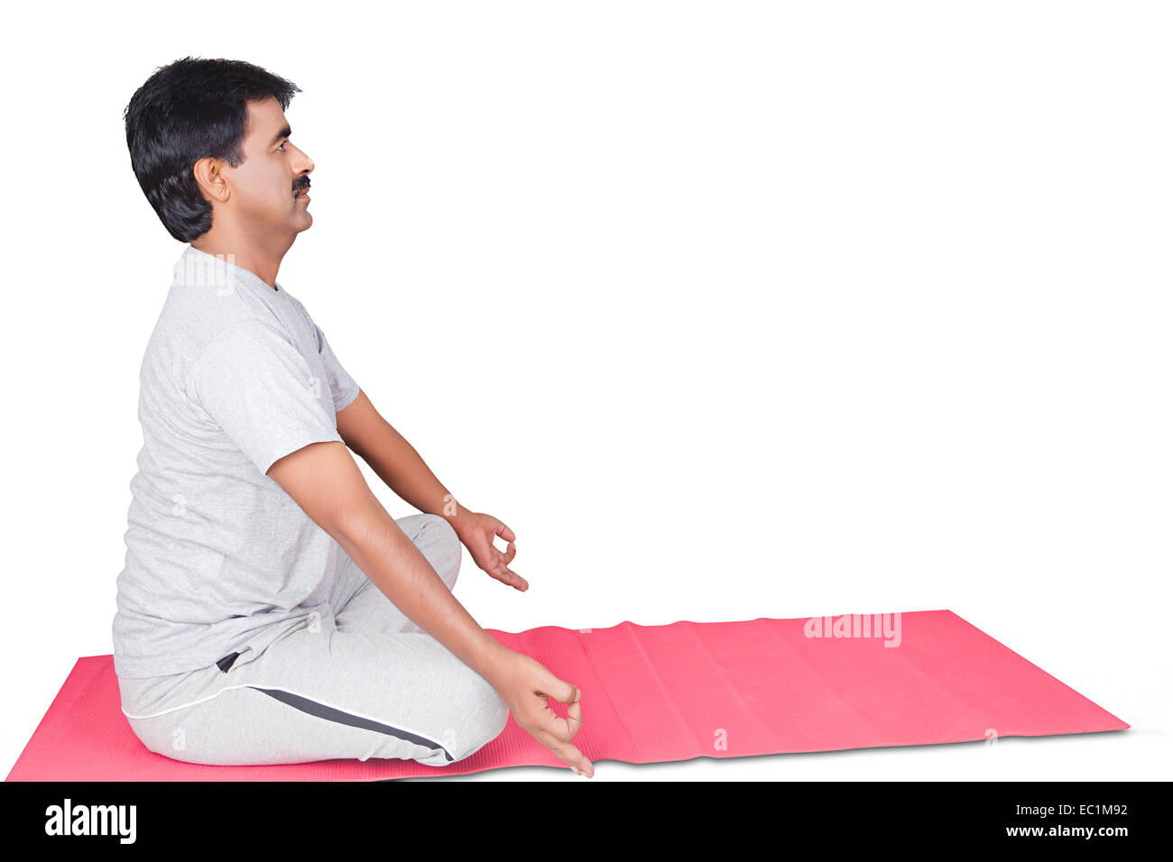 indian man yoga Padmasana Stock Photo