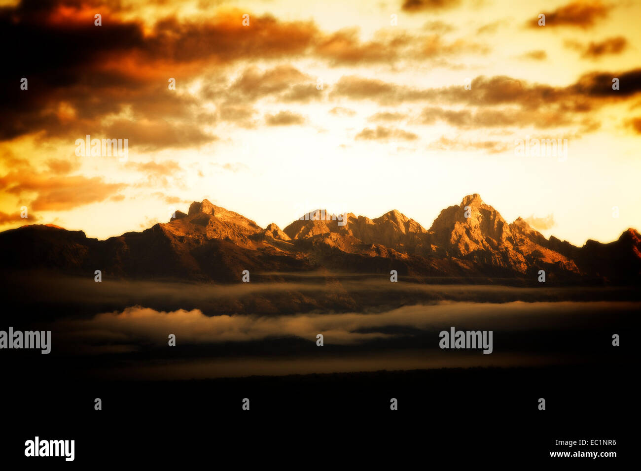 The Teton mountain range in Wyoming at sunrise. Stock Photo