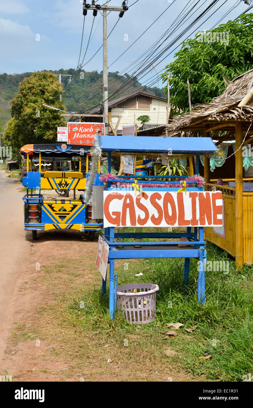 Roadside gasoline fuel filling station stall with song tao, Koh Lanta, Thailand Stock Photo