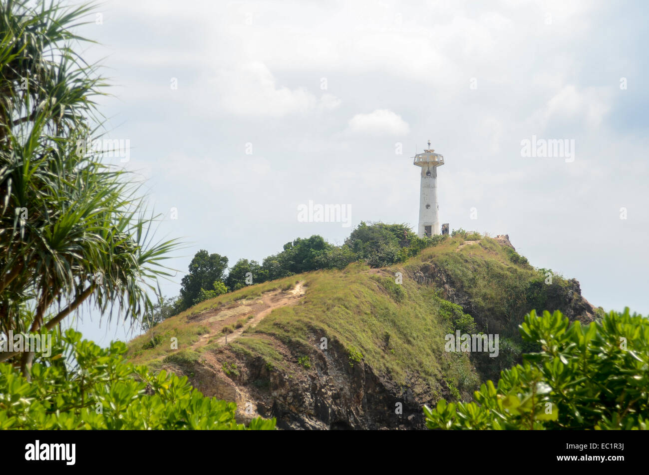 View of distant lighthouse from Koh Lanta National Park, Koh lanta, Thailand Stock Photo
