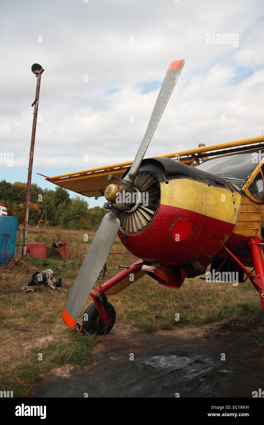 The old plane against the cloudy sky Stock Photo - Alamy
