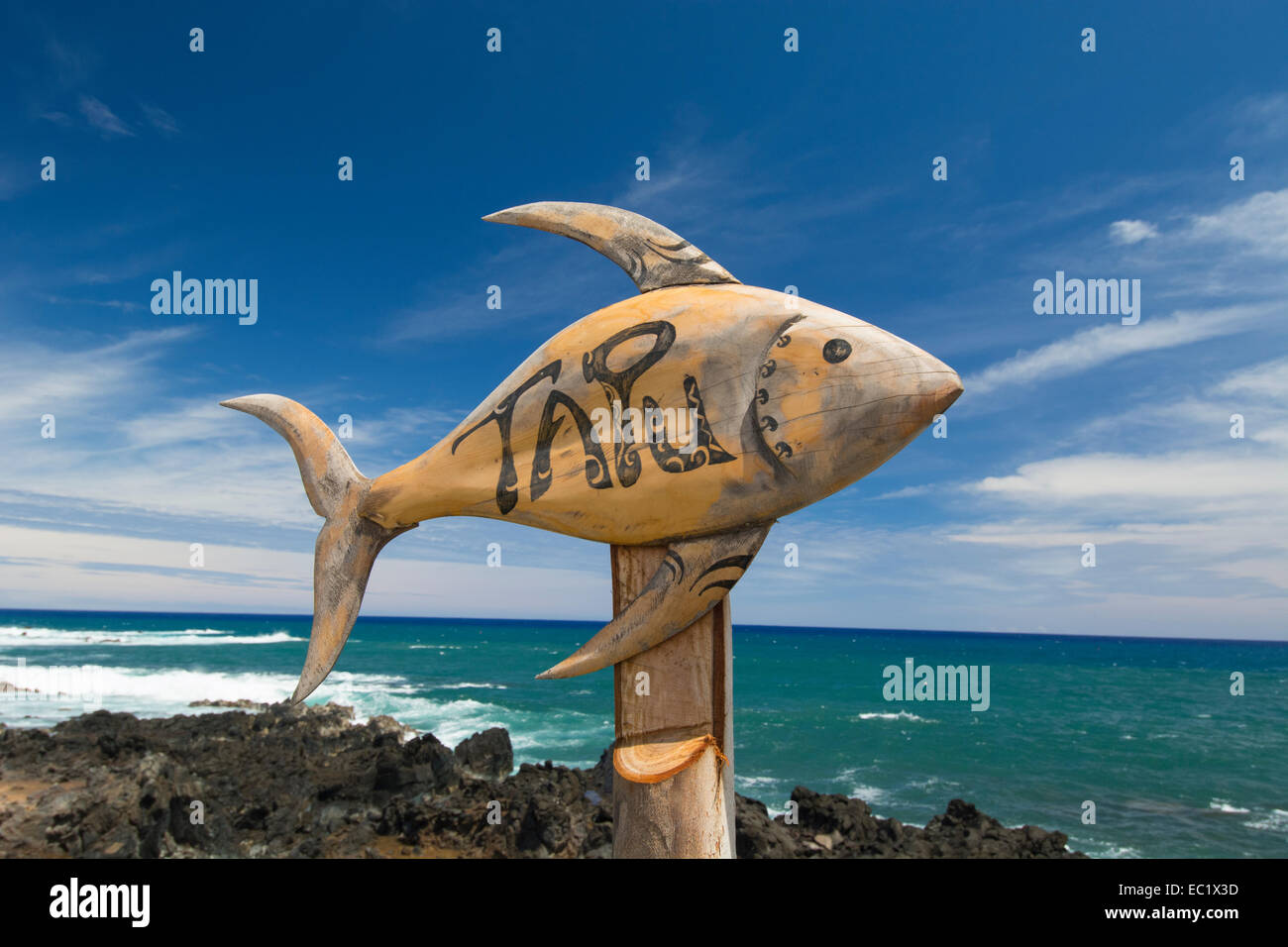 Chile, Easter Island aka Rapa Nui, Hanga Roa. Carved wooden fish "tapu" danger or caution sign
