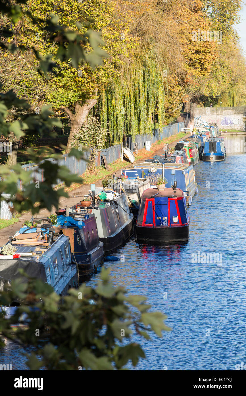 Houseboats along the canal by Victoria Park, Hackney, London, United Kingdom Stock Photo
