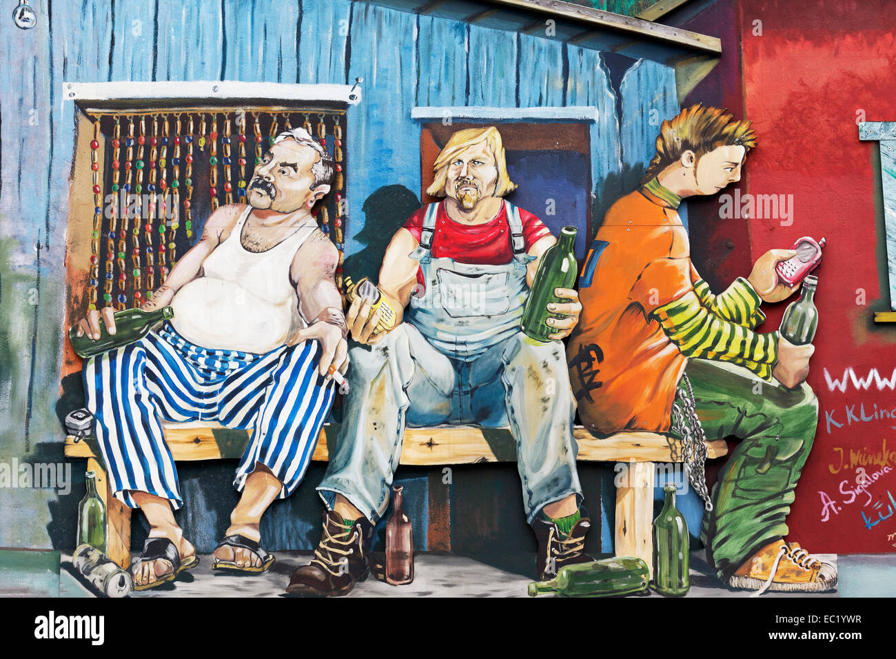 Three men unemployed men on a bench, drinking alcohol, Hartz IV, caricature, mural, street art, Düsseldorf Stock Photo