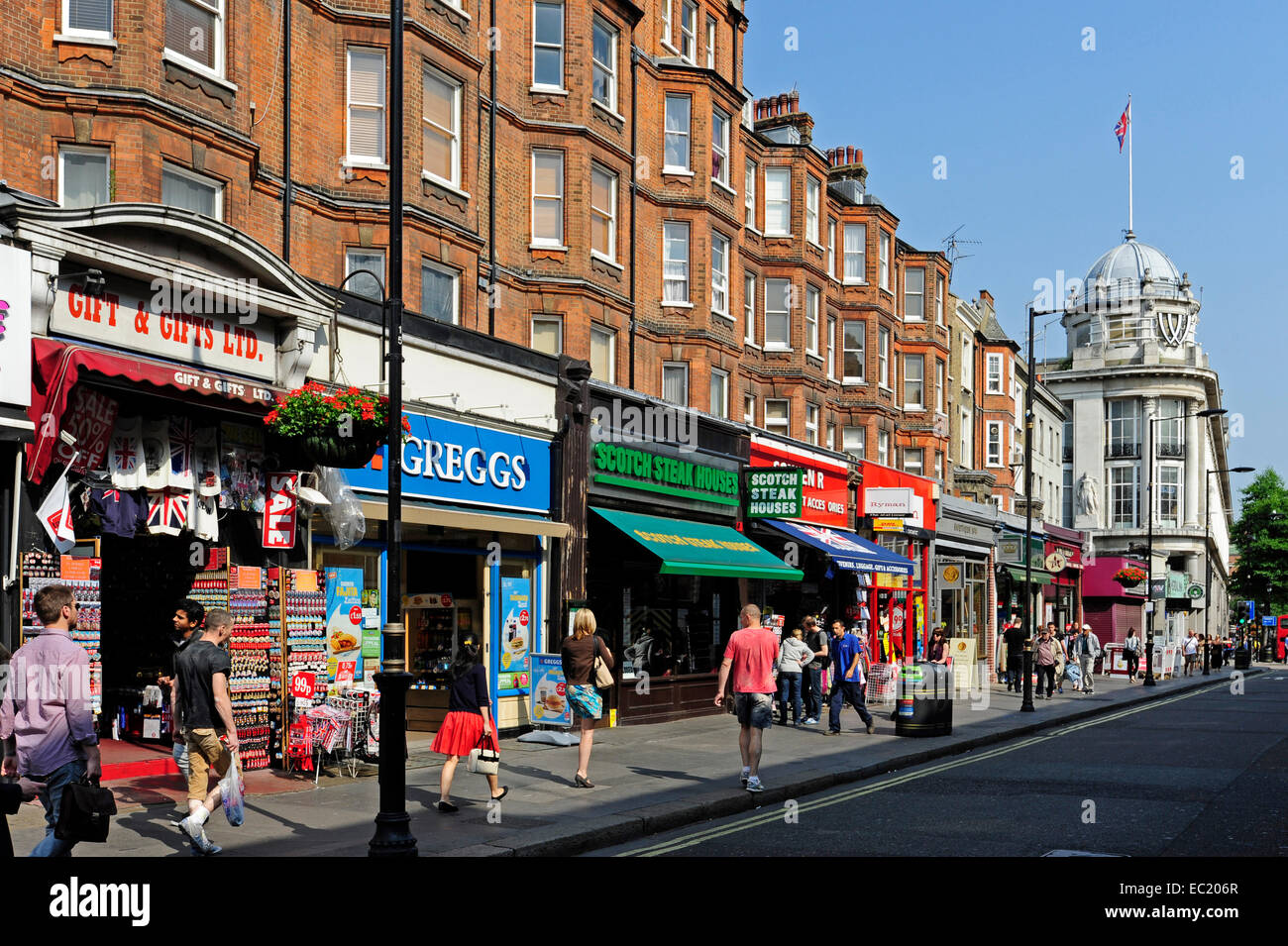 Small shops at the Queensway, Bayswater, London, England, United Kingdom Stock Photo