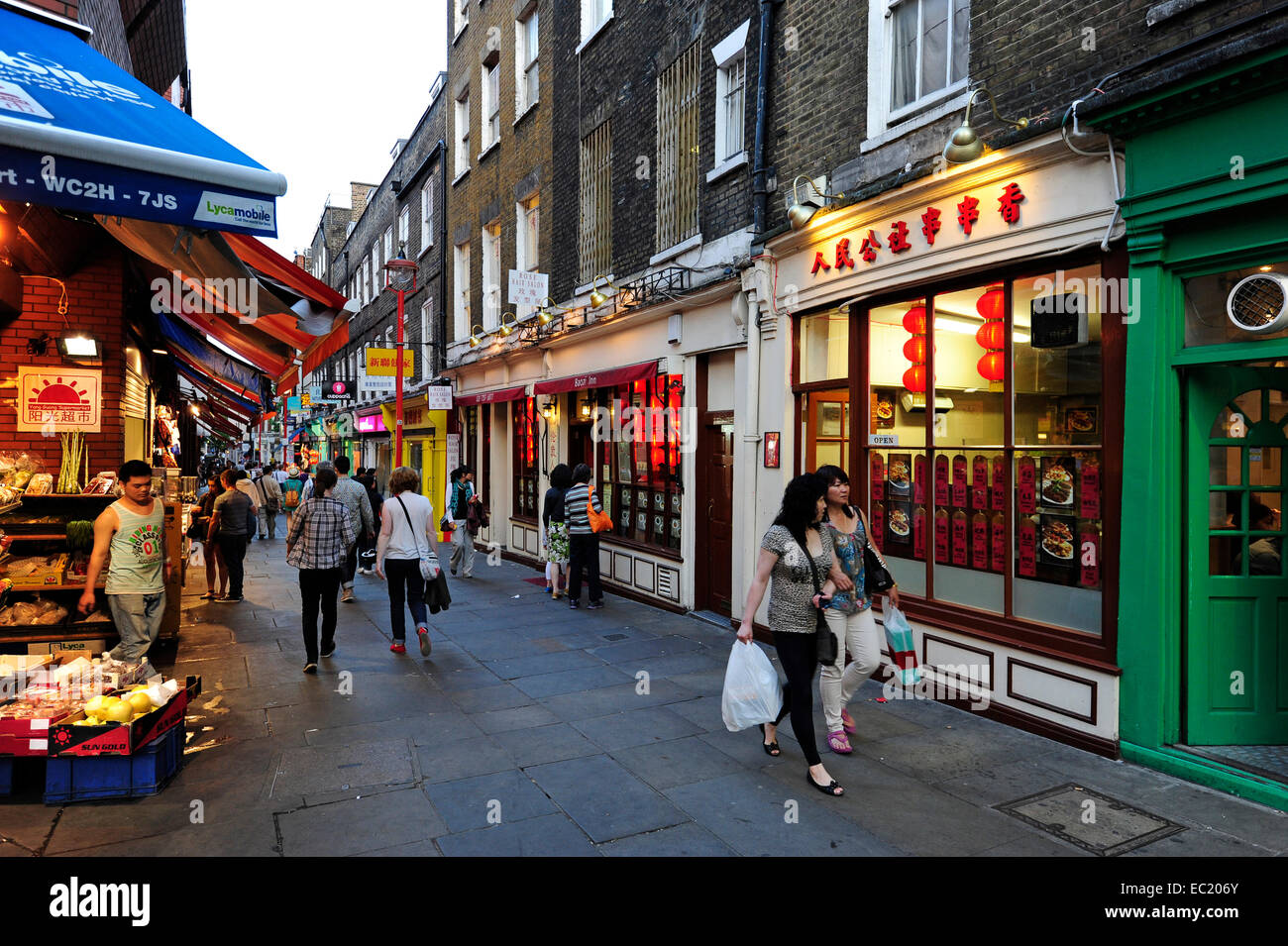 People shopping, Newport Court, Chinatown, Soho, West End, London, England, United Kingdom Stock Photo