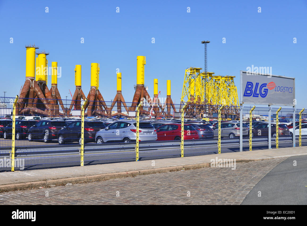 New cars, components for offshore wind turbines in the back, port, Bremerhaven, Bremen, Germany Stock Photo
