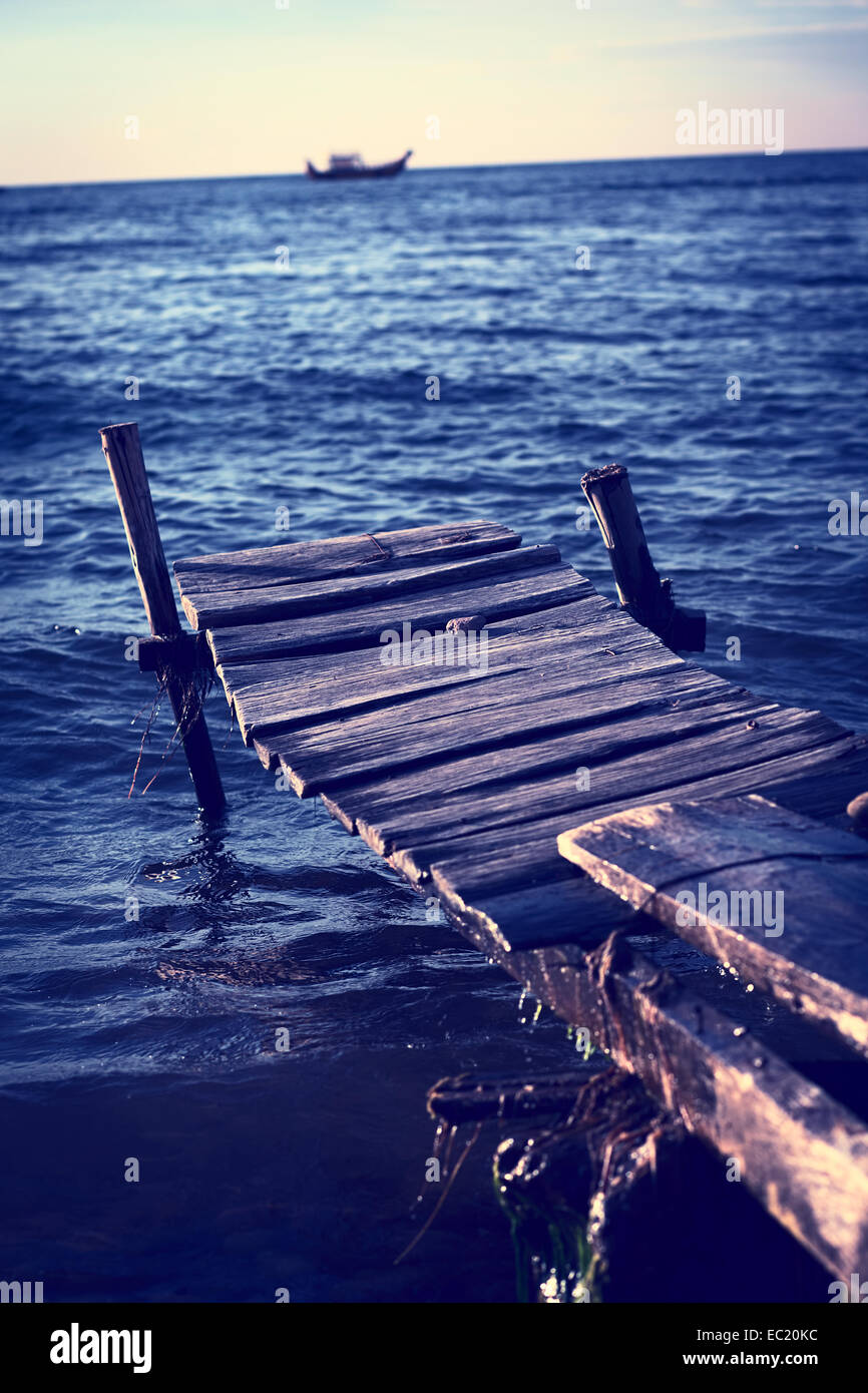 Wooden pier leading into lake hi-res stock photography and images - Alamy