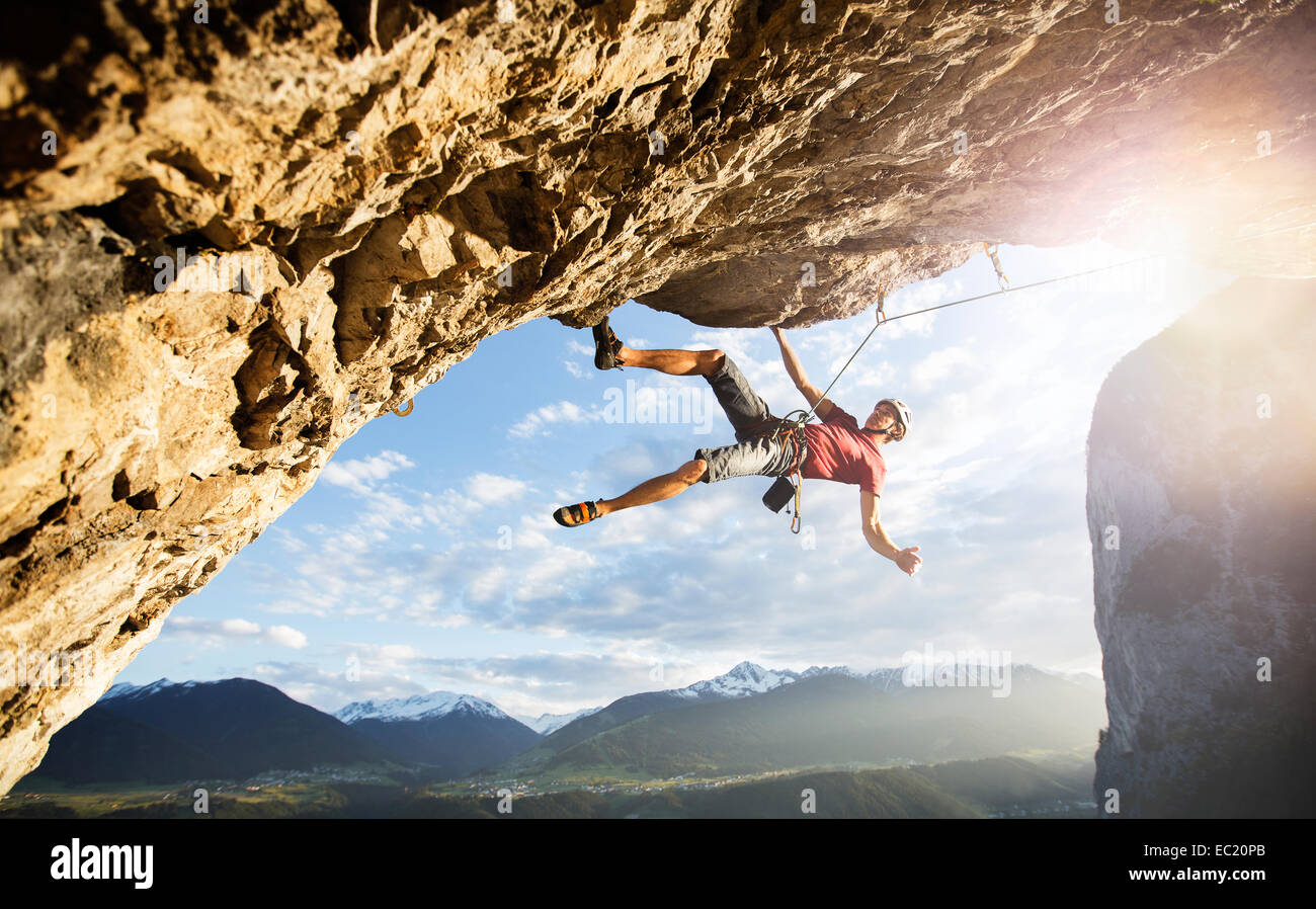 Freeclimber with helmet climbing on a rock face, Martinswand, gallery, Innsbruck, Tyrol, Austria Stock Photo