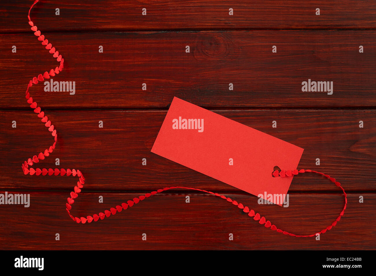 Wooden board background with red heart ribbon and tag, Valentines day ...