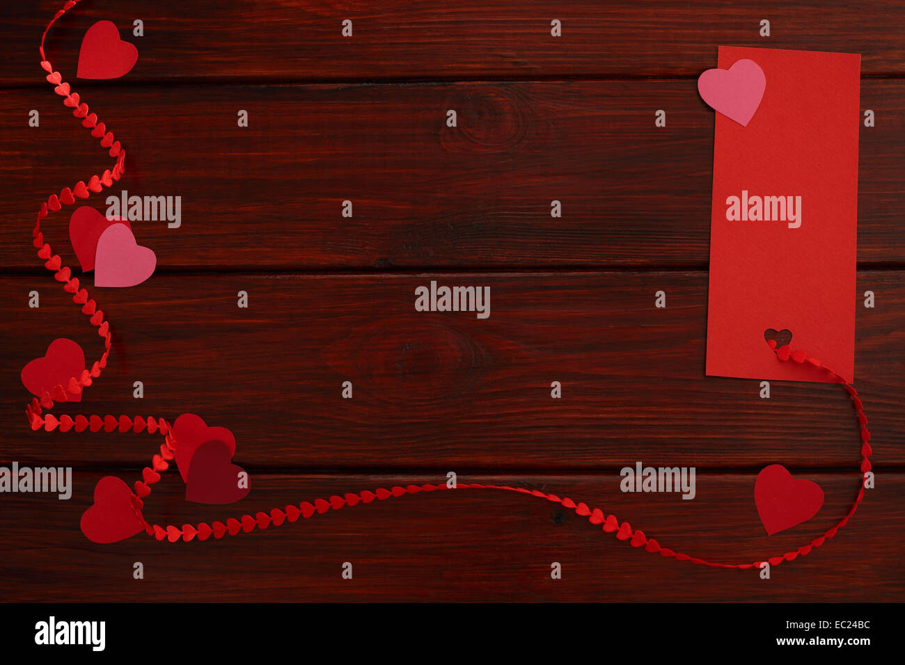 Wooden board background with red heart ribbon and tag, Valentines day ...