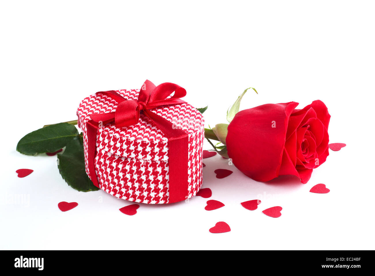 Valentines day gift box, rose and paper hearts isolated on white